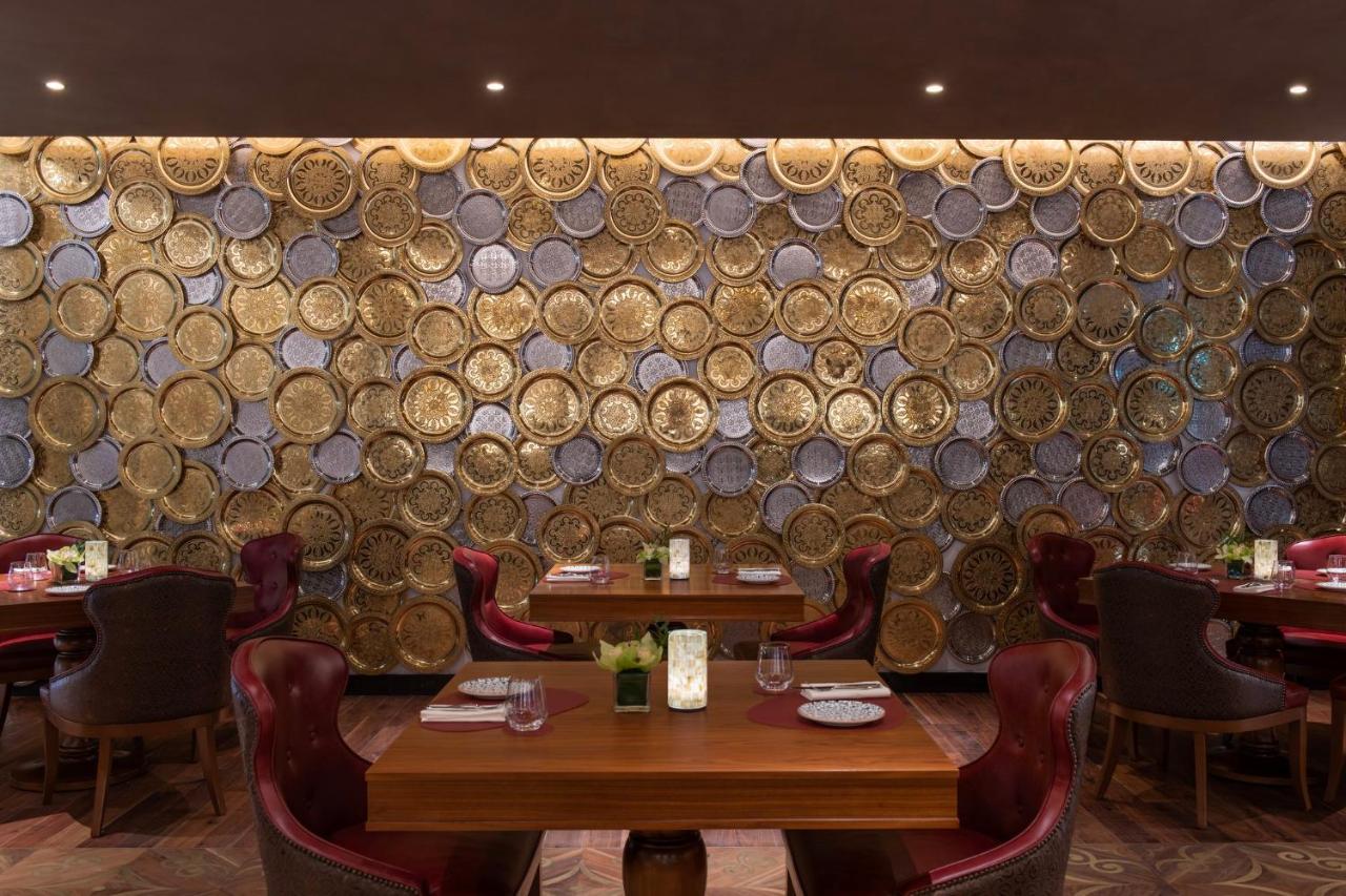 Abesq Doha Hotel And Residences, An Ihg Hotel Kültér fotó The interior of the restaurant