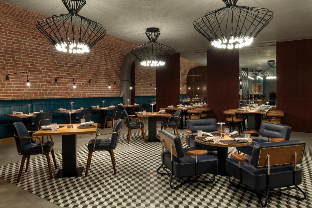 Abesq Doha Hotel And Residences, An Ihg Hotel Kültér fotó The interior of the restaurant
