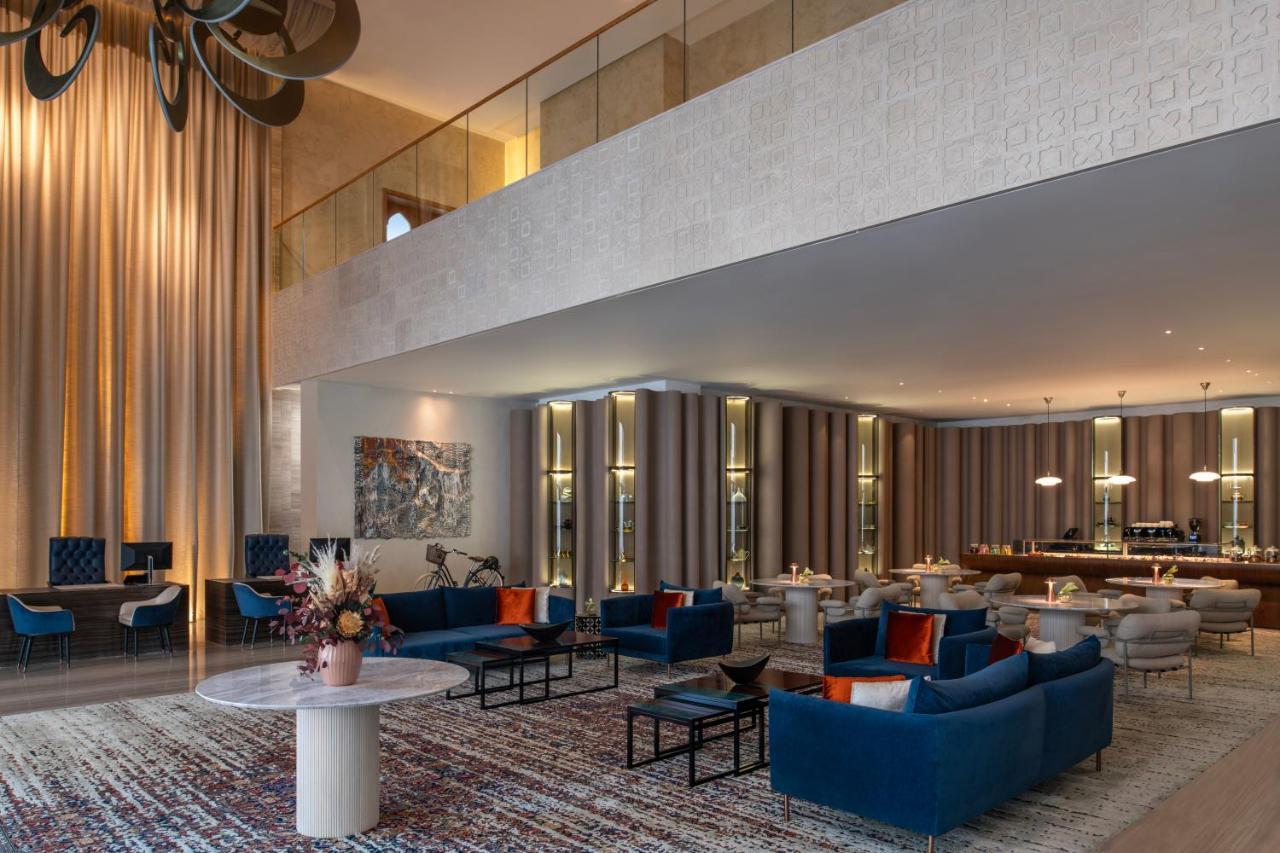Abesq Doha Hotel And Residences, An Ihg Hotel Kültér fotó The lobby of the hotel